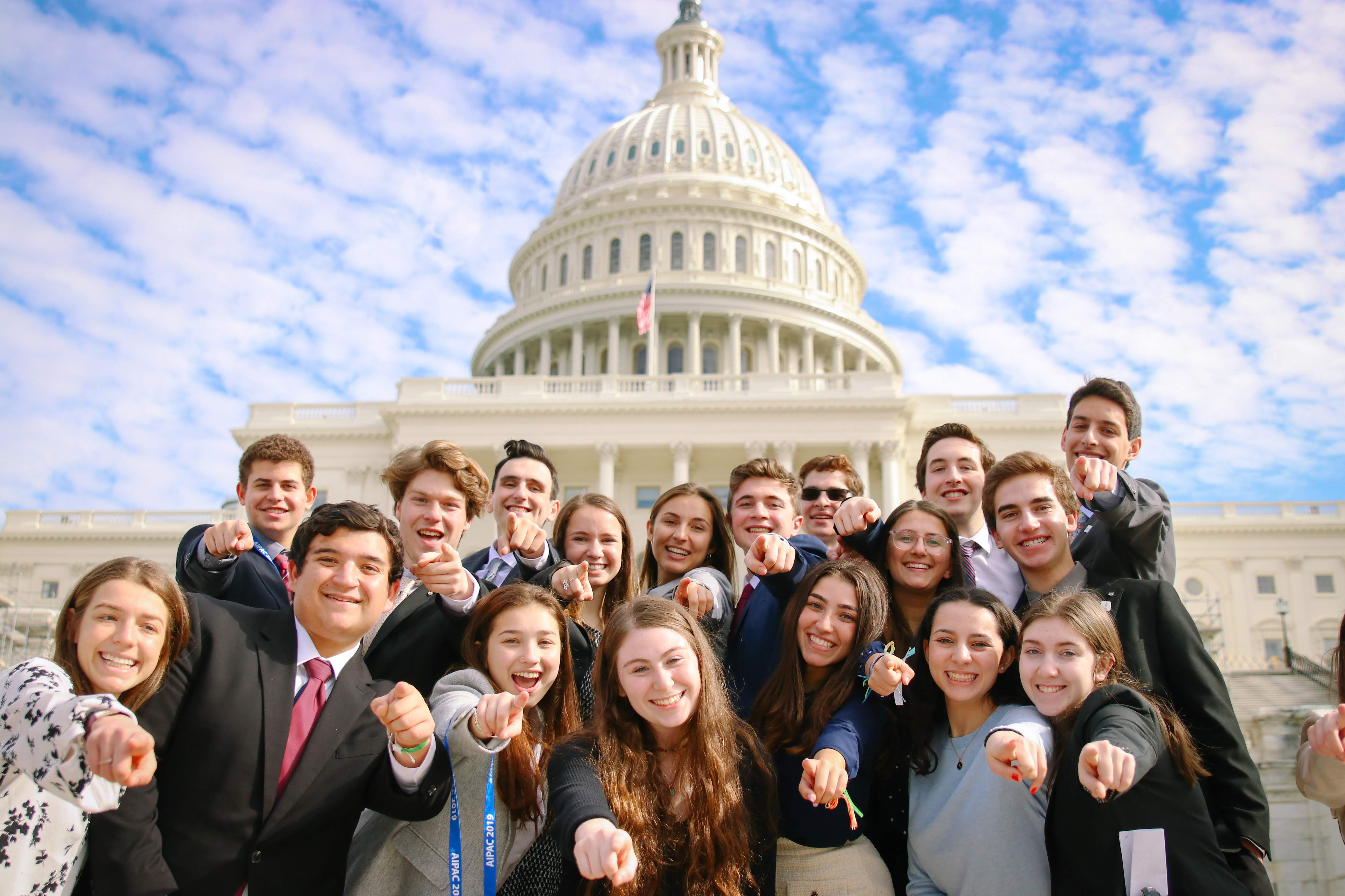 Group of people celebrating on stage