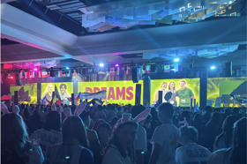 Group of people celebrating on stage