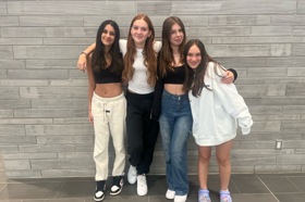 Group of people celebrating on stage