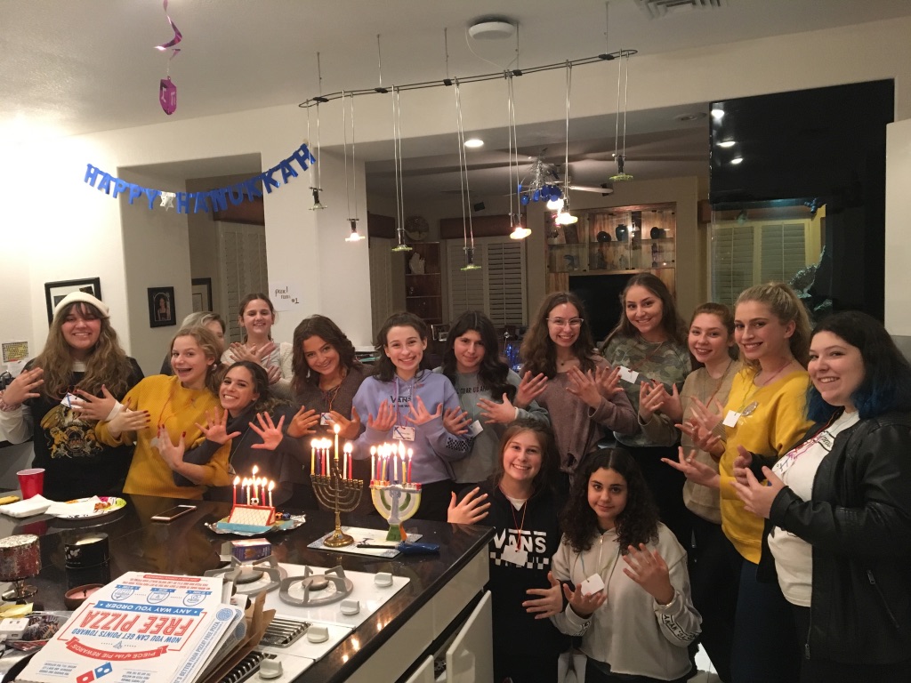 Group of people celebrating on stage