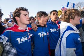 Group of people celebrating on stage