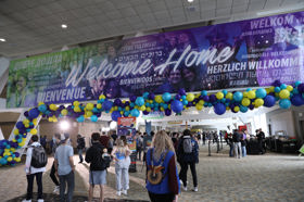 Group of people celebrating on stage