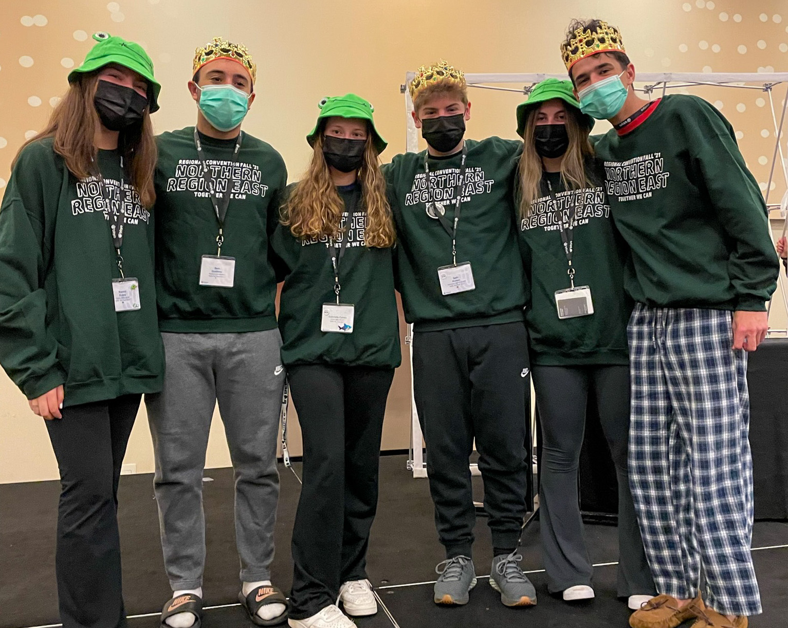 Group of people celebrating on stage