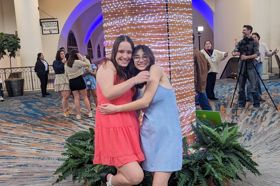 Group of people celebrating on stage