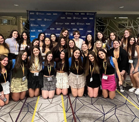 Group of people celebrating on stage