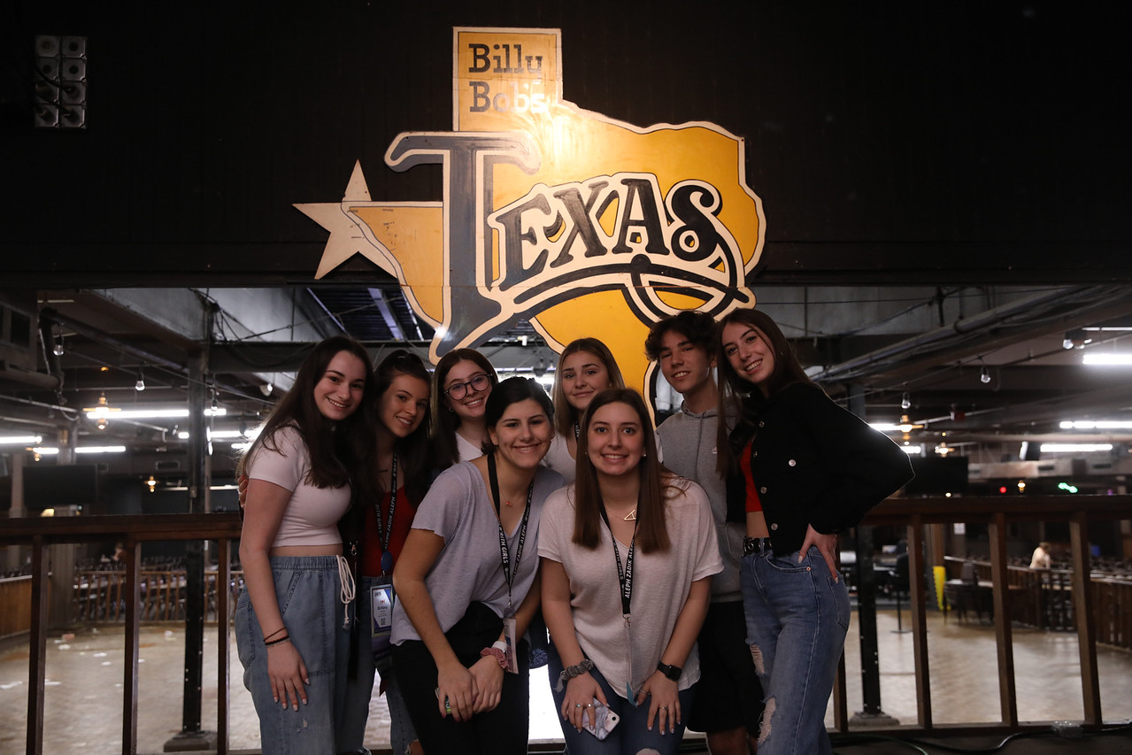 Group of people celebrating on stage