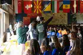 Group of people celebrating on stage