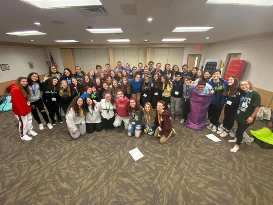 Group of people celebrating on stage
