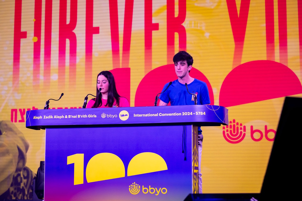Group of people celebrating on stage