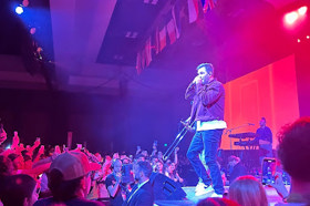 Group of people celebrating on stage