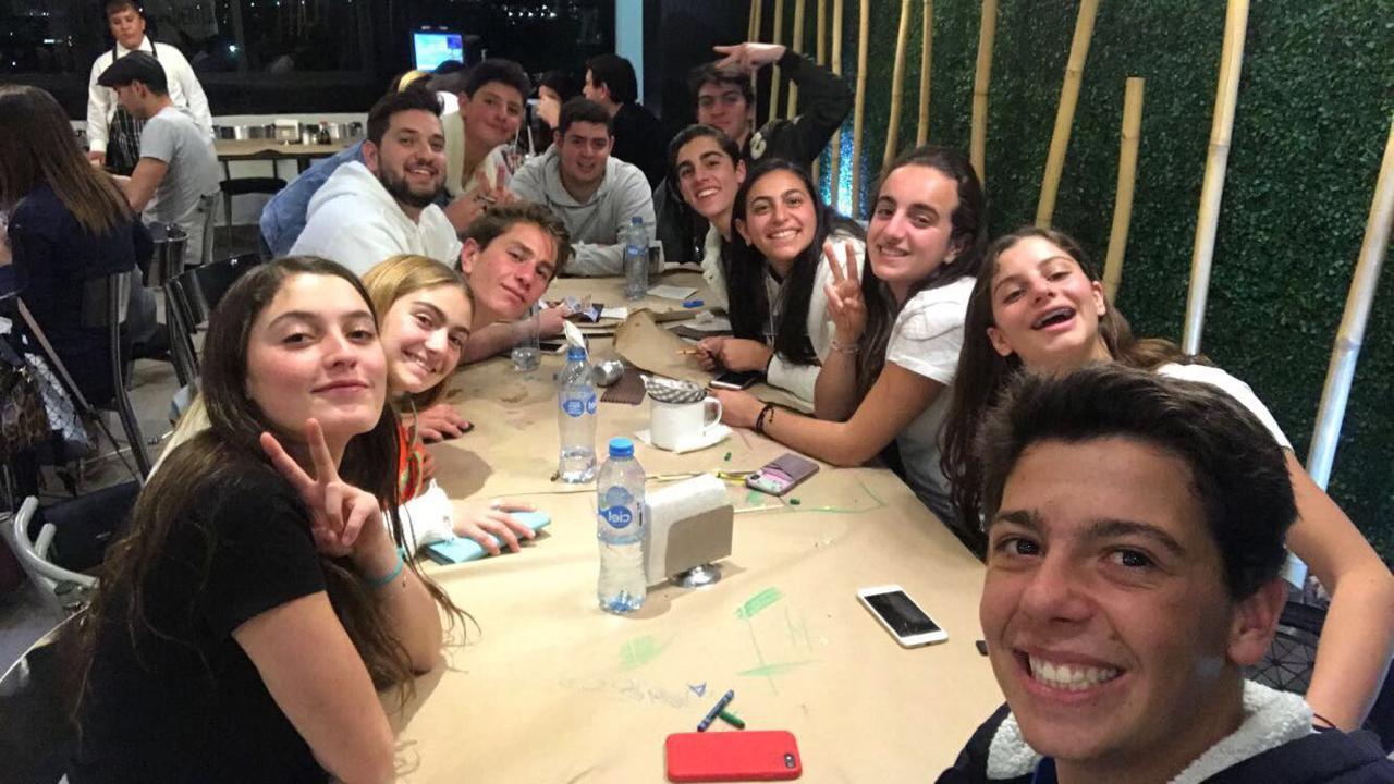 Group of people celebrating on stage