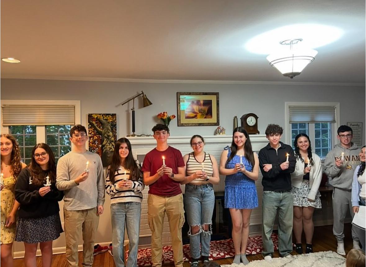 Group of people celebrating on stage