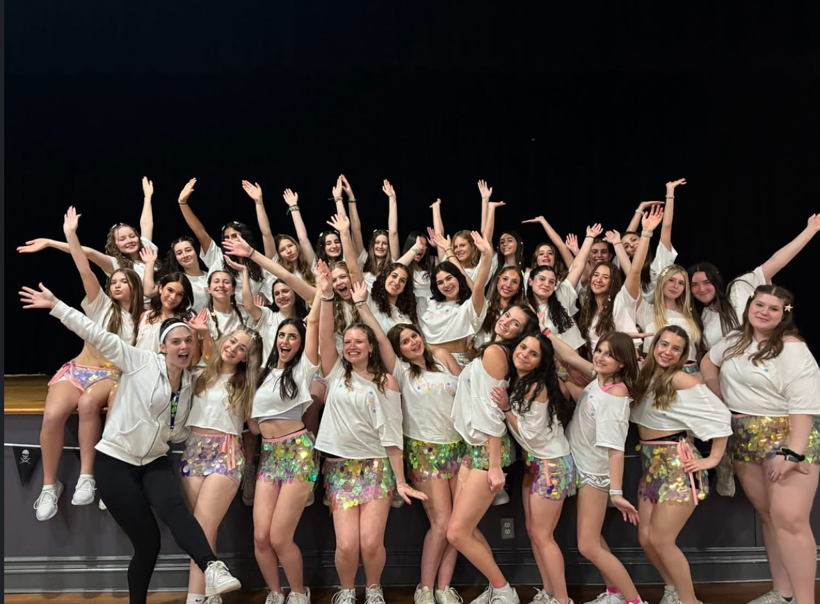 Group of people celebrating on stage
