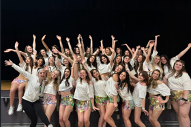 Group of people celebrating on stage