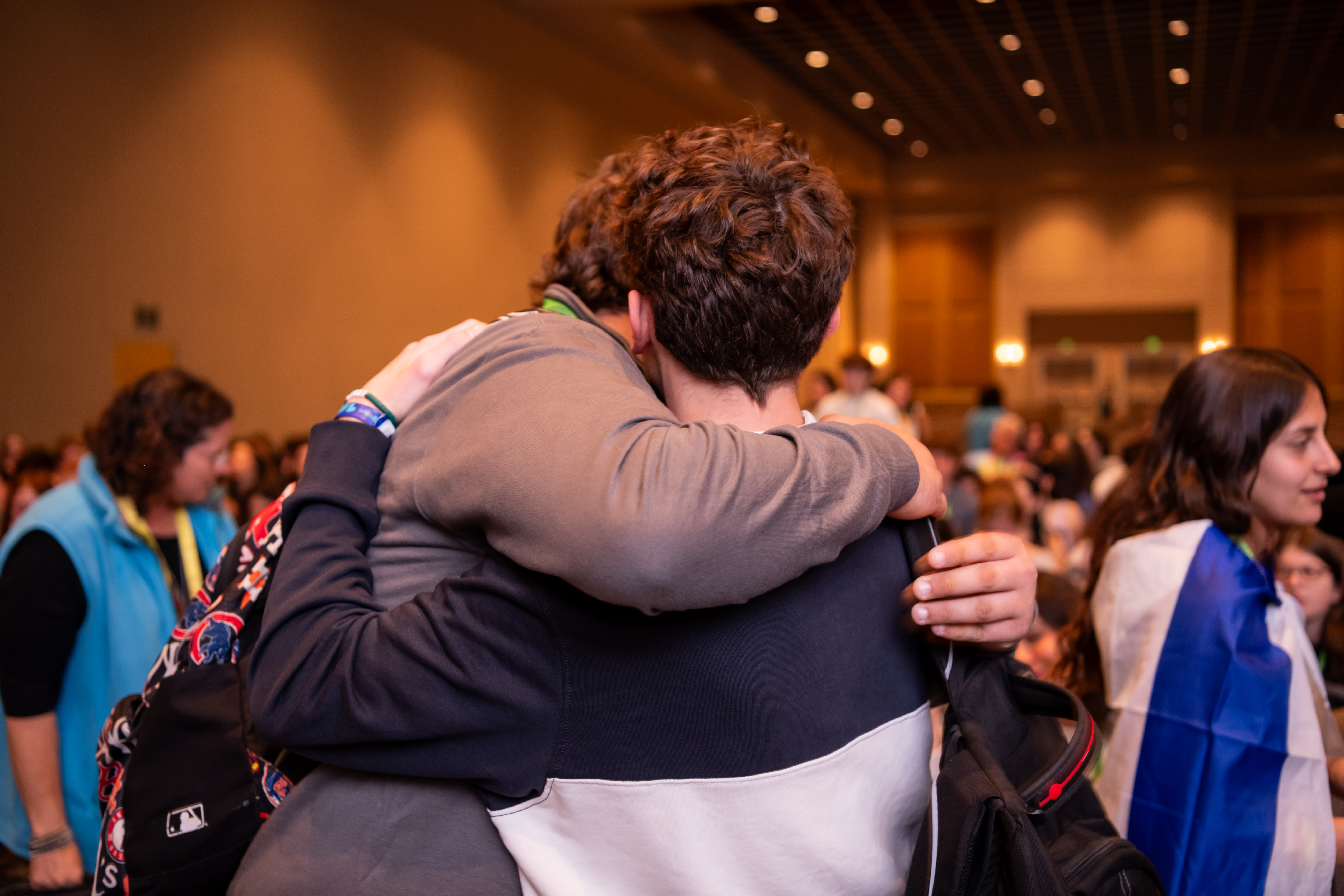 Group of people celebrating on stage