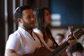 Group of people celebrating on stage