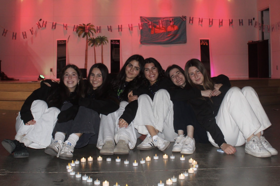 Group of people celebrating on stage