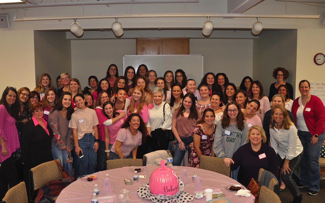 Group of people celebrating on stage