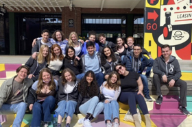 Group of people celebrating on stage