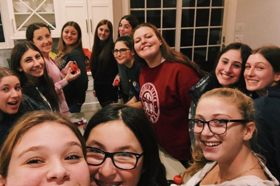 Group of people celebrating on stage