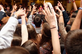 Group of people celebrating on stage