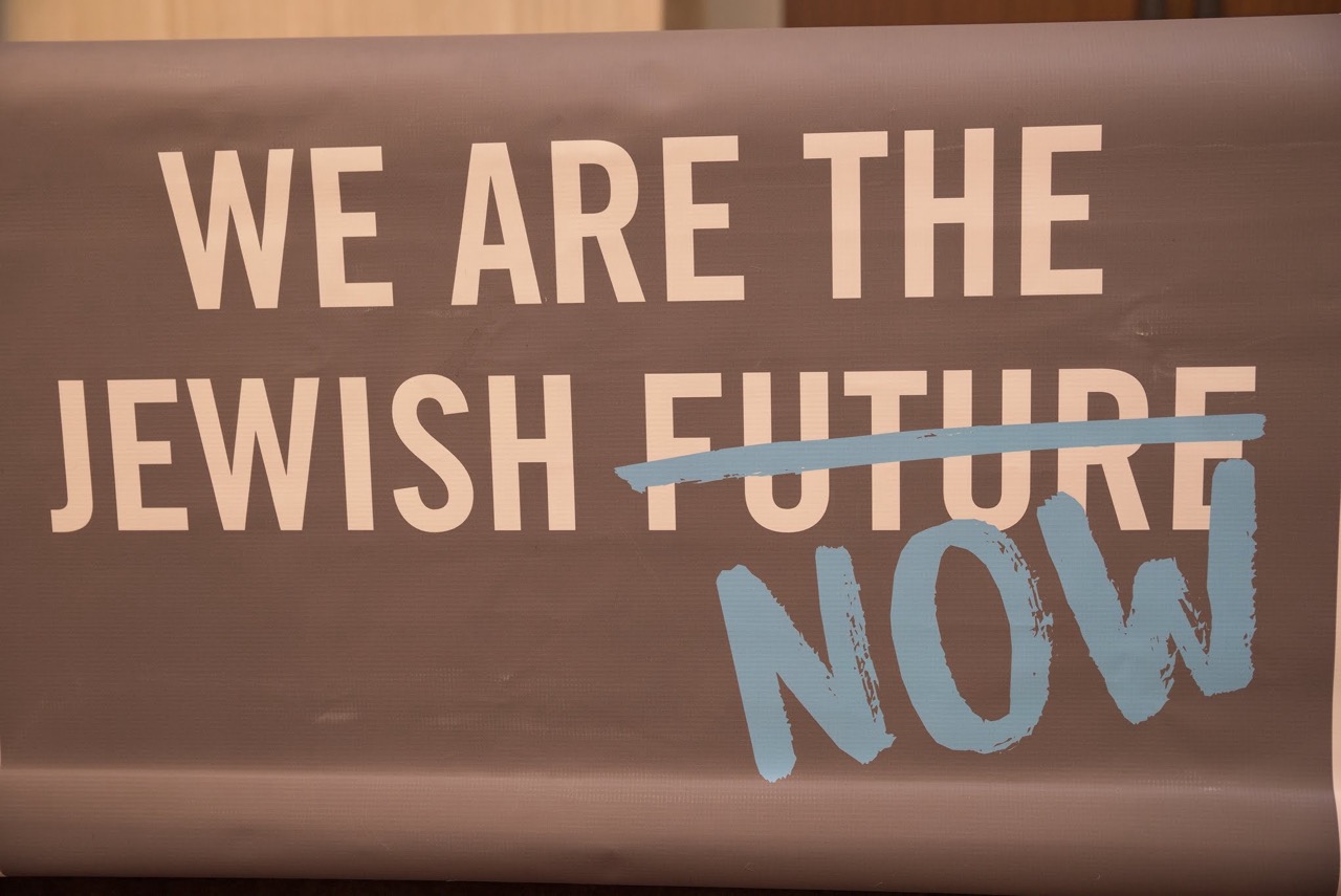 Group of people celebrating on stage