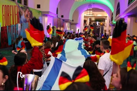 Group of people celebrating on stage