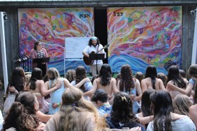 Group of people celebrating on stage