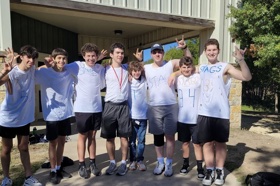 Group of people celebrating on stage