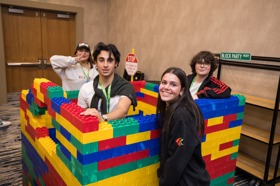 Group of people celebrating on stage