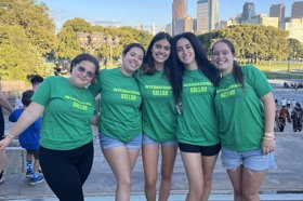 Group of people celebrating on stage