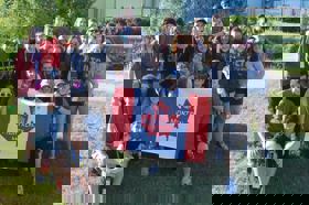 Group of people celebrating on stage