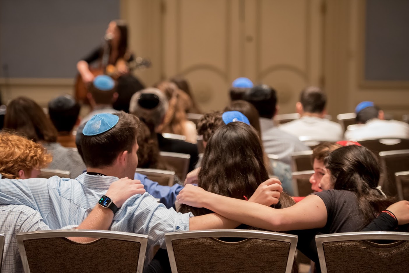 Group of people celebrating on stage