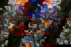 Group of people celebrating on stage