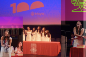 Group of people celebrating on stage