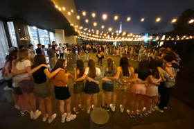 Group of people celebrating on stage