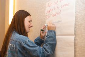 Group of people celebrating on stage
