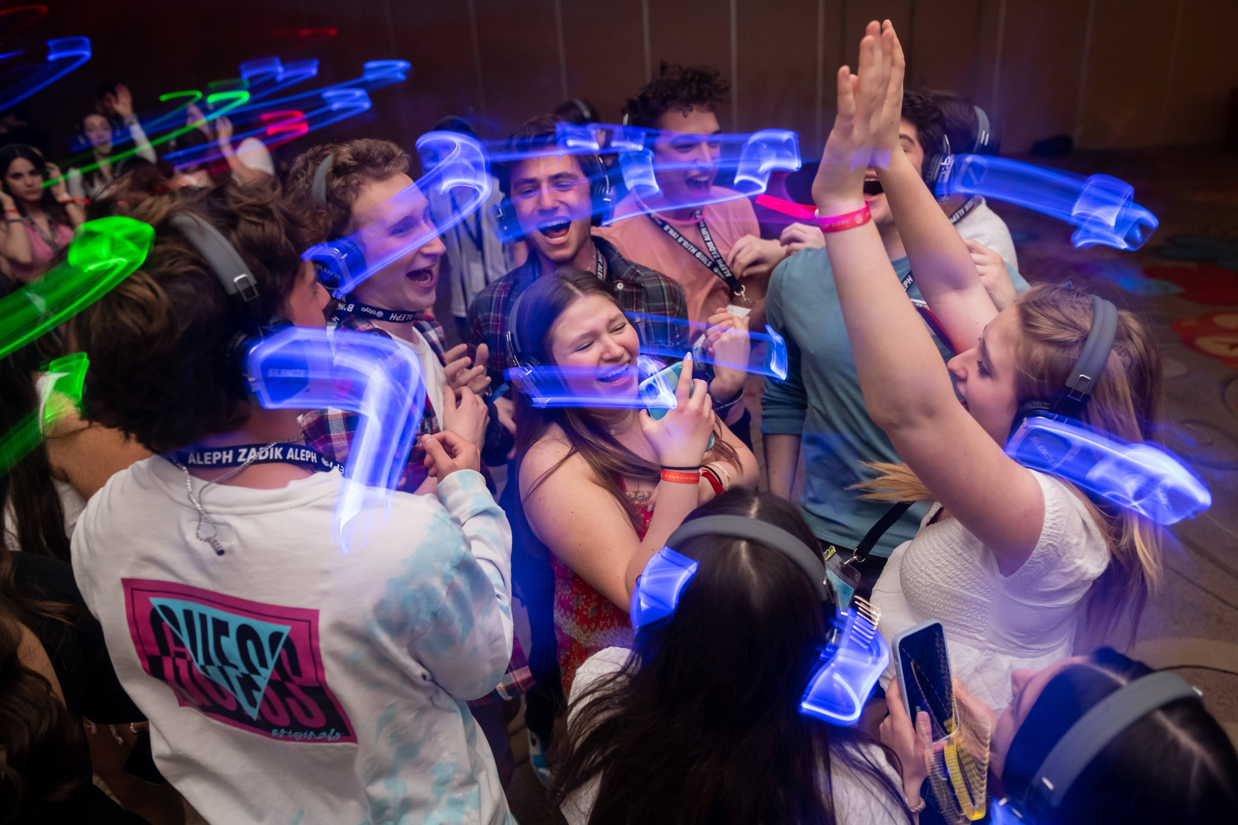 Group of people celebrating on stage