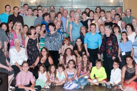 Group of people celebrating on stage