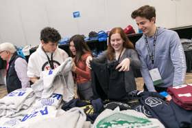 Group of people celebrating on stage
