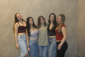 Group of people celebrating on stage