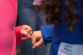 Group of people celebrating on stage