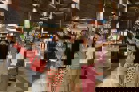 Group of people celebrating on stage