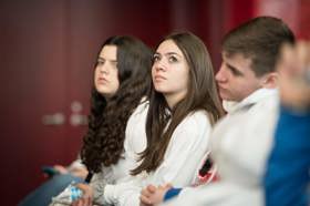 Group of people celebrating on stage