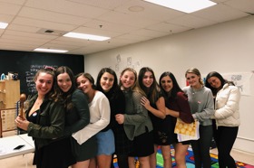 Group of people celebrating on stage