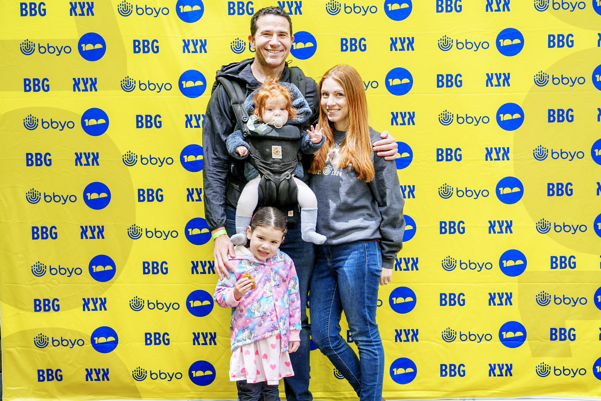 Group of people celebrating on stage