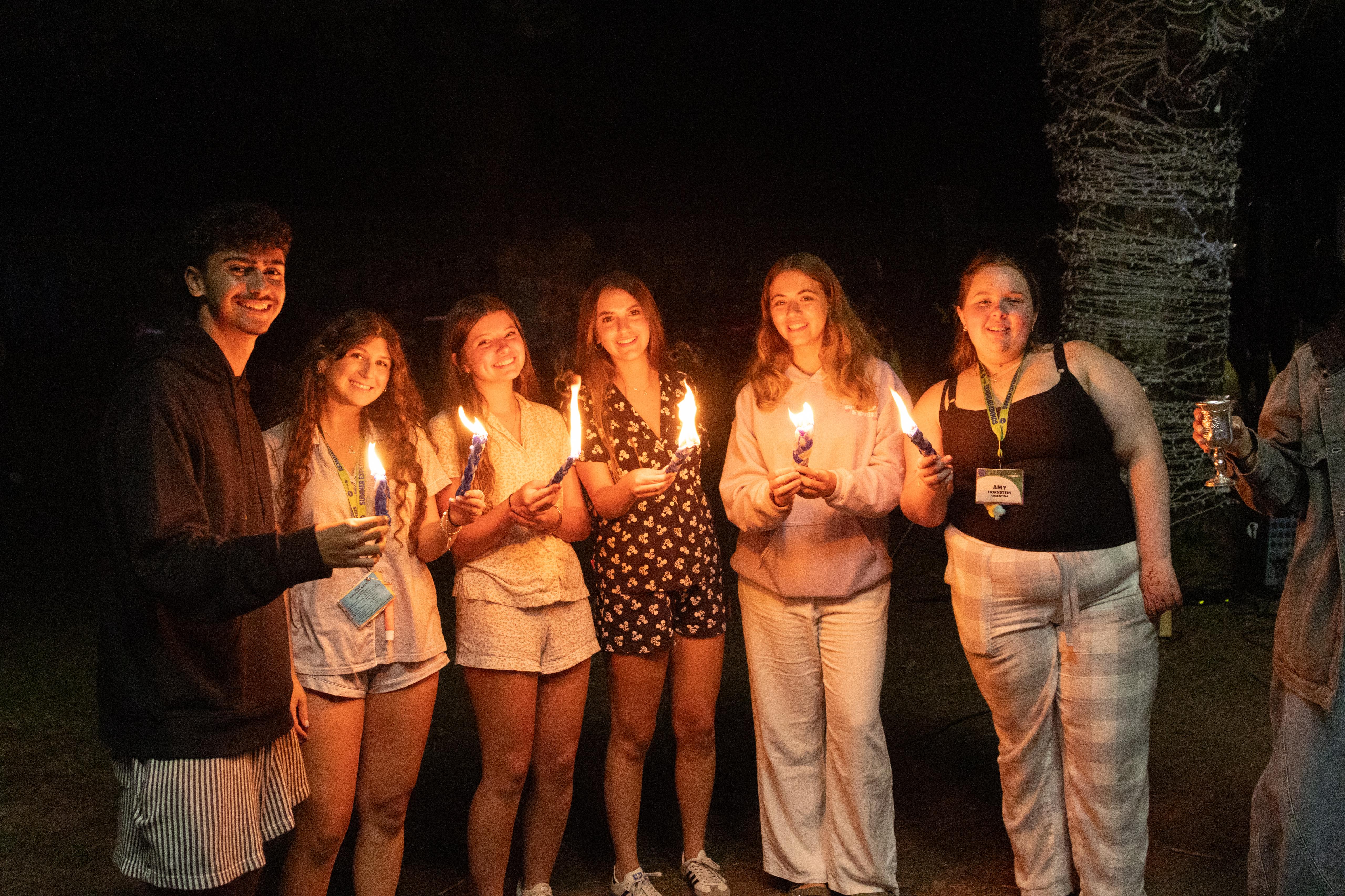 Group of people celebrating on stage