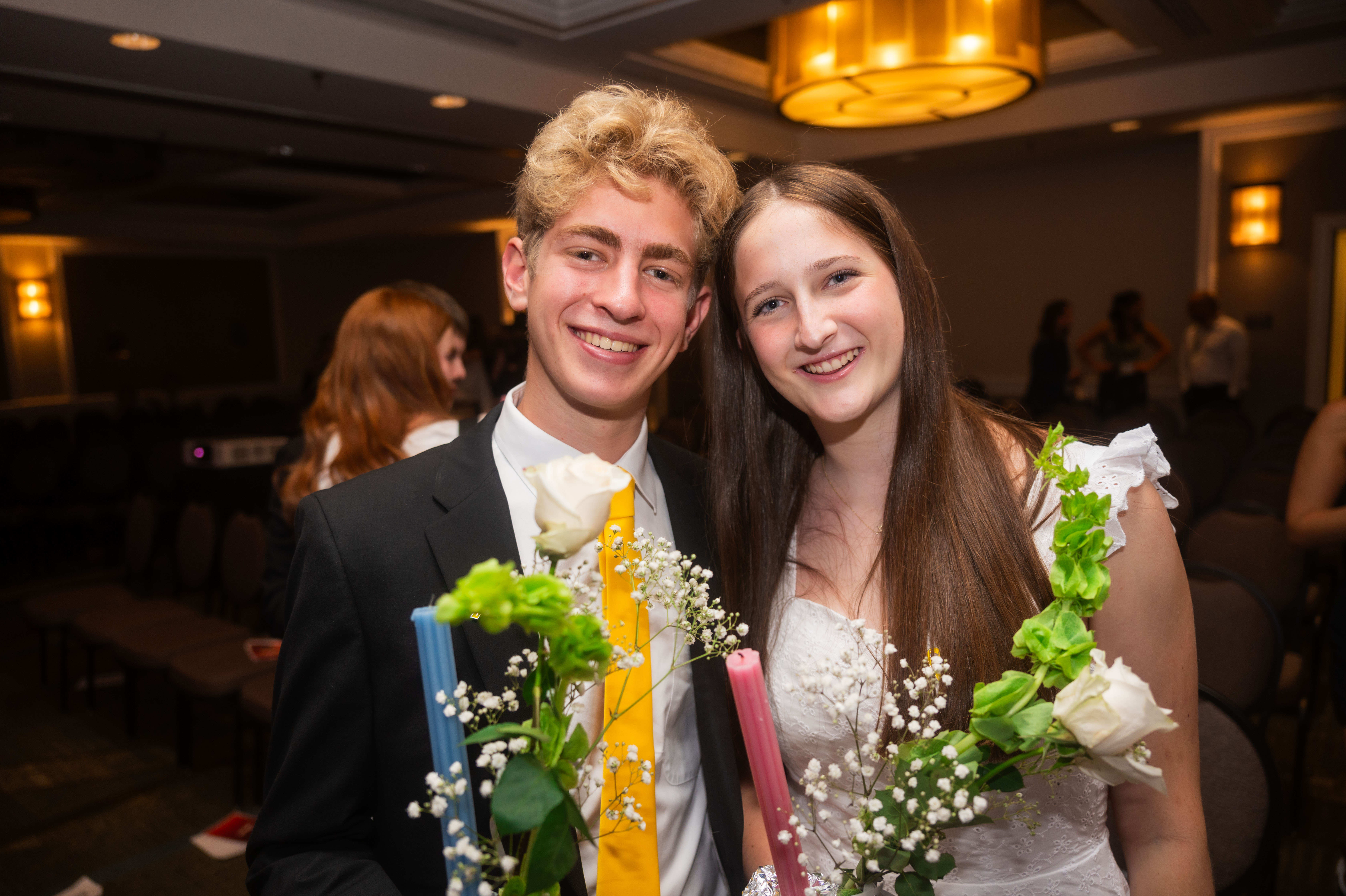 Group of people celebrating on stage