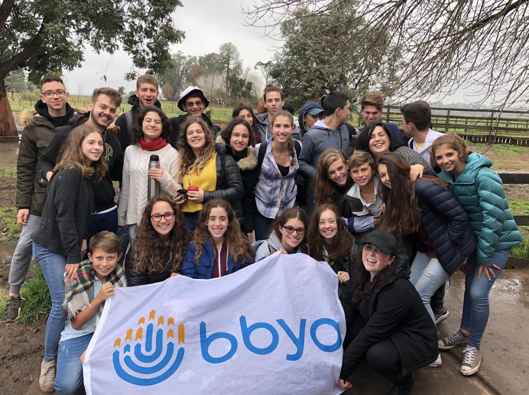 Group of people celebrating on stage