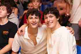 Group of people celebrating on stage